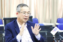 Assoc. Prof. Dr. Neak Chandarith, Director of the Institute for International Studies and Public Policy (IISPP) at the Royal University of Phnom Penh grants an interview to the Vietnam News Agency. (Photo: VNA)