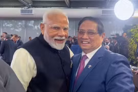 PM Pham Minh Chinh (R) and his Indian counterpart Narendra Modi in Rio de Janeiro (Photo: Government Portal)