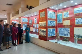 More than 200 images, documents, and artifacts highlighting the brilliant milestones of the Communist Party of Vietnam (CPV) over the last 95 years are being displayed at an exhibition in Hanoi. (Photo: VNA)