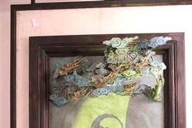 The work "Coi nguon" (Origin) at the exhibition. (Photo: VNA)