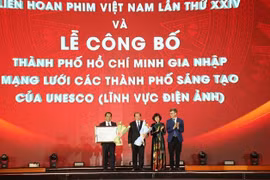 Delegates at the ceremony announcing Ho Chi Minh City joining the UNESCO Creative Cities Network (UCCN) for film. (Photo: VNA)