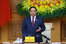 Prime Minister Pham Minh Chinh addresses the 14th meeting of the Central Council for Emulation and Commendation in Hanoi on October 20 (Photo: VNA)