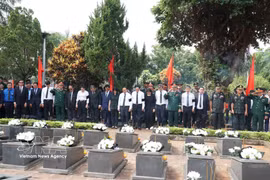 Remains of 18 Vietnamese martyrs repatriated from Cambodia laid to rest in Gia Lai. (Photo: VNA)