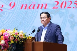 PM Pham Minh Chinh speaks at the meeting. (Photo: VNA)