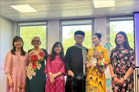 Hoang Thu Trang (third from the right) at an event organised by Art Space (Photo: VNA)