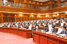 Deputies attend the first session of the 10th National Assembly of Laos. (Photo: VNA)