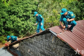 Police and military officers contribute over 10,000 workdays to help build 1,000 houses for local residents - Illustrative image (Photo: https://www.qdnd.vn/)