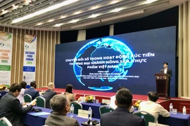 People attend a discussion at the 2025 Vietnam Food Forum. (Photo: VNA)