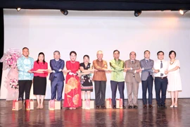 Consuls General of ASEAN countries, HCM City officials, and leaders of the HCM City Union of Friendship Organisations shake hands at the ceremony. (Photo: VNA)