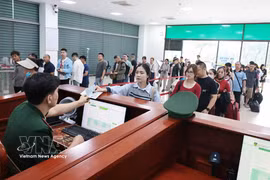 Members of the public are advised to check their tax status before travelling abroad. (Photo: VNA)