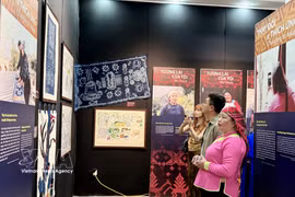 The exhibition brings authentic stories of ethnic minority women in the buffer zone of Hoang Lien National Park as they adapt to climate change and develop sustainable ecotourism. (Photo: VNA)