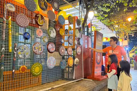 Numerous experiential spaces for young people and children at the programme Hanoi Dep Sound on the Hanoi Book Street (Photo: VietnamPlus)