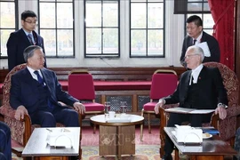 General Secretary of the Communist Party of Vietnam (CPV) Central Committee To Lam (left) meets with Speaker of the UK House of Lords John McFall (Baron McFall of Alcluith) in London on October 29. (Photo: VNA)