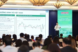 Bui Thanh Minh, deputy director of the Office of the Research and Development Board for the Private Economic Sector, speaks at “Sustainable Development 2025: A New Era for Green Growth,” a seminar held in HCM City on August 28. (Photo courtesy of the organiser)