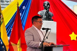 Nahum Fernández, Politburo member and Vice President of PSUV in charge of mass mobilisation speaks at event. (Photo: VNA)