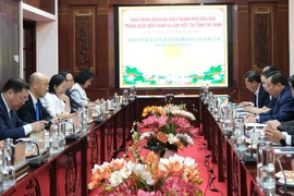 The meeting between Tay Ninh and Huaibei officials on October 14 (Source: baolongan.vn)