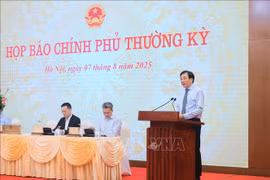Minister and Chairman of the Government Office Tran Van Son, who is Spokesperson of the Government, speaks at the press conference. (Photo: VNA)
