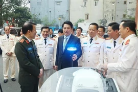 President Luong Cuong inspects equipment serving the operations of the Security Guard Force (Photo: VNA)