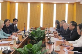 At the working session between Vietnamese Minister of Construction Tran Hong Minh and Australian Ambassador to Vietnam Gillian Bird. (Photo: VNA)