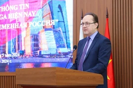 Russian Ambassador to Vietnam G.S. Bezdetko speaks at an event in 2024 to share information about cooperation between Vietnam and Russia (Photo: VNA)