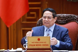 PM Pham Minh Chinh speaks at the meeting (Photo: VNA)