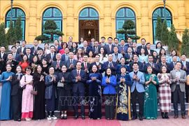 State Vice President Vo Thi Anh Xuan (eighth, left) and other delegates take group photo (Photo: VNA)