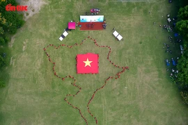One of the festival’s highlights is a formation of the map of Vietnam by more than 1,000 yoga practitioners (Photo: VNA)