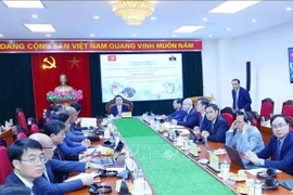 An overview of the seminar on the Party’s leadership in ensuring macroeconomic stability, renewing the growth model, restructuring the economy and promoting international integration (Photo: VNA)