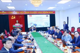 An overview of the seminar on the Party’s leadership in ensuring macroeconomic stability, renewing the growth model, restructuring the economy and promoting international integration (Photo: VNA)