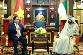 Prime Minister Pham Minh Chinh (L) holds talks with UAE Vice President and Prime Minister Sheikh Mohammed bin Rashid Al Maktoum in Dubai on October 28, 2024 (local time) (Photo: VNA)