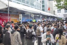 Labourers at a job fair held in HCM City (Photo: VNA)