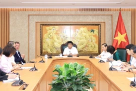 Deputy Prime Minister Nguyen Chi Dung (centre) at a meeting with German-based Avestos Group on July 23, 2025. (VNA)
