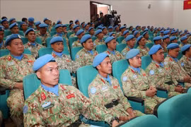 Members of the missions of Engineering Unit Rotation 3 and Level-2 Field Hospital Rotation 6 at the conference (Photo: VNA)