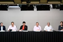 Members of the Singapore Economic Resilience Taskforce at the National Press Centre @ MDDI on July 10. (Photo: channelnewsasia.com)