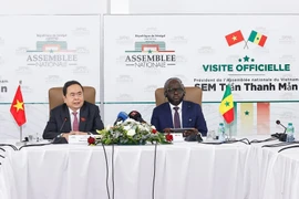 Chairman of the Vietnamese NA Tran Thanh Man (L) and President of the Senegalese NA Malick Ndiaye at their talks in Dakar on July 23 (Photo: VNA)