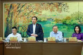 The Hanoi delegation of NA deputies at the group discussions (Photo: VNA)