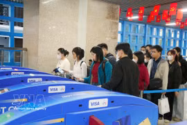 Automated ticketing system is used on the urban railway Cat Linh-Ha Dong line in Hanoi. (Photo: VNA)
