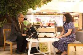 Thai scholar Kavi Chongkittavorn (left) in an interview granted to the Vietnam News Agency ahead of Thai Prime Minister Paetongtarn Shinawatra’s official visit to Vietnam. (Photo: VNA)