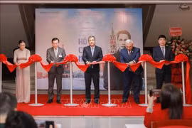 Delegates at the opening ceremony of the exhibition “Ho Chi Minh’s Footprints in the Homeland of the October Revolution” at Ho Chi Minh Museum on December 8. (Photo: VNA)