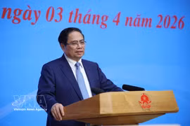 Prime Minister Pham Minh Chinh speaks at the hybrid meeting of the National Steering Committee for International Integration on April 3. (Photo: VNA)