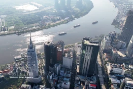 Financial buildings in central Ho Chi Minh City along the Saigon River, facing the Thu Thiem Peninsula in An Khanh ward. (Photo: VNA)