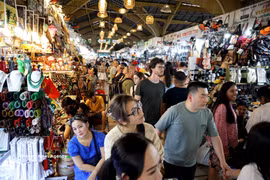 Tourists in Ho Chi Minh City (Photo: VNA)