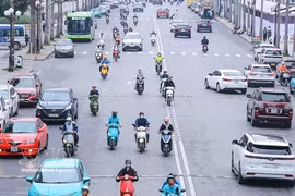 With their advantages and convenience, electric vehicles are becoming increasingly common in the daily lives. (Photo: VNA) 