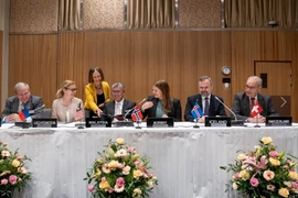 At the signing ceremony (Photo: the Malaysian Ministry of Investment, Trade and Industry - Bernama.com)