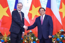 Vietnamese Prime Minister Pham Minh Chinh (R) and Czech Prime Minister Petr Fiala. (Photo: VNA)