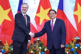 Vietnamese Prime Minister Pham Minh Chinh (R) and Czech Prime Minister Petr Fiala. (Photo: VNA)