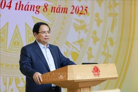 Prime Minister Pham Minh Chinh, head of the National Steering Committee on Semiconductor Industry Development, chairs the committee’s second meeting in Hanoi on August 4. (Photo: VNA)