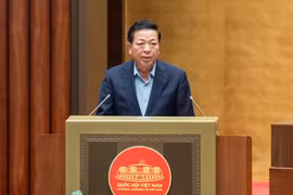 Minister of Construction Tran Hong Minh speaks at the meeting (Photo: tuoitre.vn)