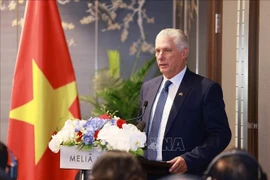 First Secretary of the Communist Party of Cuba Central Committee and President of Cuba Miguel Diaz-Canel Bermudez at a meeting with enterprises of Vietnam and Cuba (Photo: VNA)