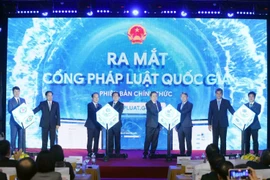 Officials at the launch of the National Law Portal on November 7, 2025. (Photo: VNA)